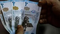 الليرة السورية مقابل الدولار