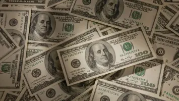 أوراق نقدية أمريكية ومؤشر سوق الأسهم.