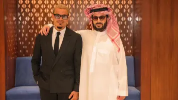 تركي آل الشيخ مع عمرو دياب خلال عرض فيلم