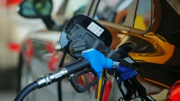 Gas station with falling fuel prices