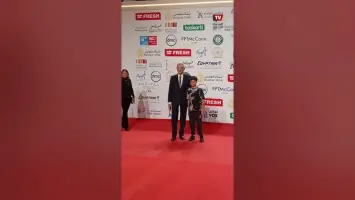 محمود حميدة وحفيده على ريد كاربيت في مهرجان القاهرة السينمائي