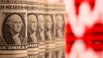 تأثير الحرب التجارية على قرارات الفائدة الأمريكية