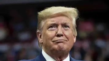 Trump Threatens Troop Deployment in Baltimore Amid Dispute with Governor