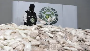 Saudi Arabia arrests 21 in drug smuggling operation, including officials
