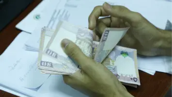الحد الأدني للراتب للحصول علي قرض في سلطنة عمان