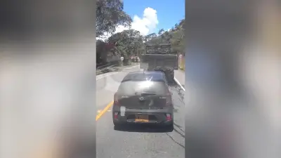 Aftermath of a bomb explosion on a busy highway in Colombia.