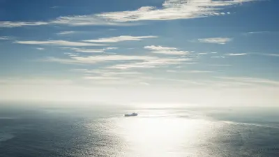 An oil tanker sailing through the ocean.
