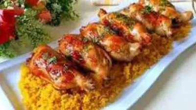 الحمام الكداب بالفراخ المحشوة بالأرز المتبل
