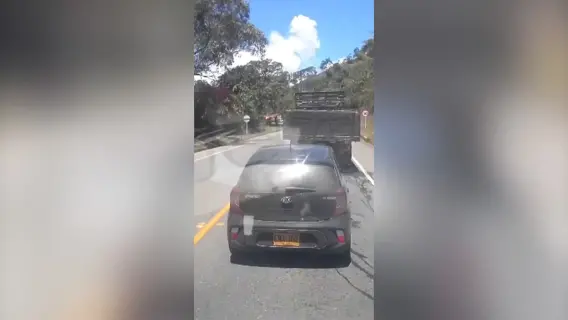 Aftermath of a bomb explosion on a busy highway in Colombia.
