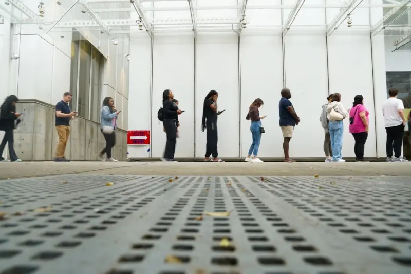 Voters enter an Atlanta polling location on the final day of early voting for the 2024 election