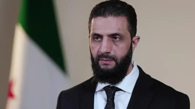 صورة لعبد الرحمن بدر الدين الأعمى الأمين العام الجديد لرئاسة الجمهورية السورية