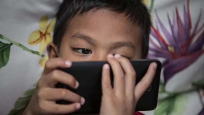 Phone in children's hands